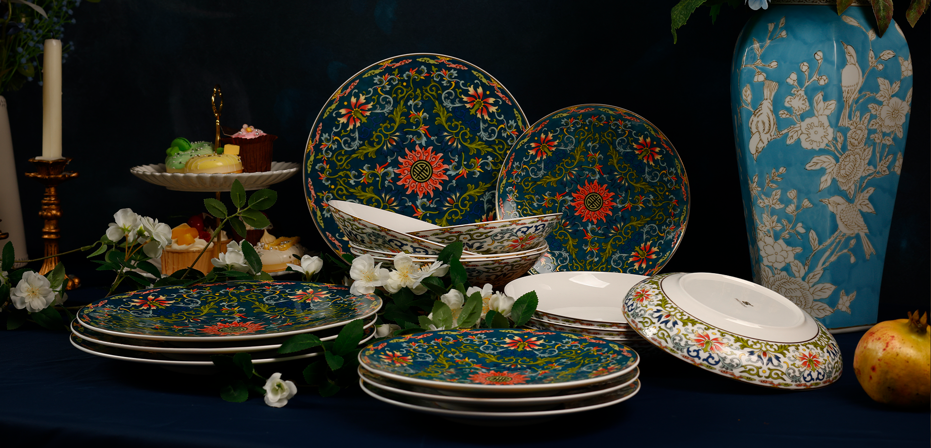 Decorative Sino Porcelain dinnerware sets (plates, bowls) on an elegant table with floral accents, showcasing the collection.