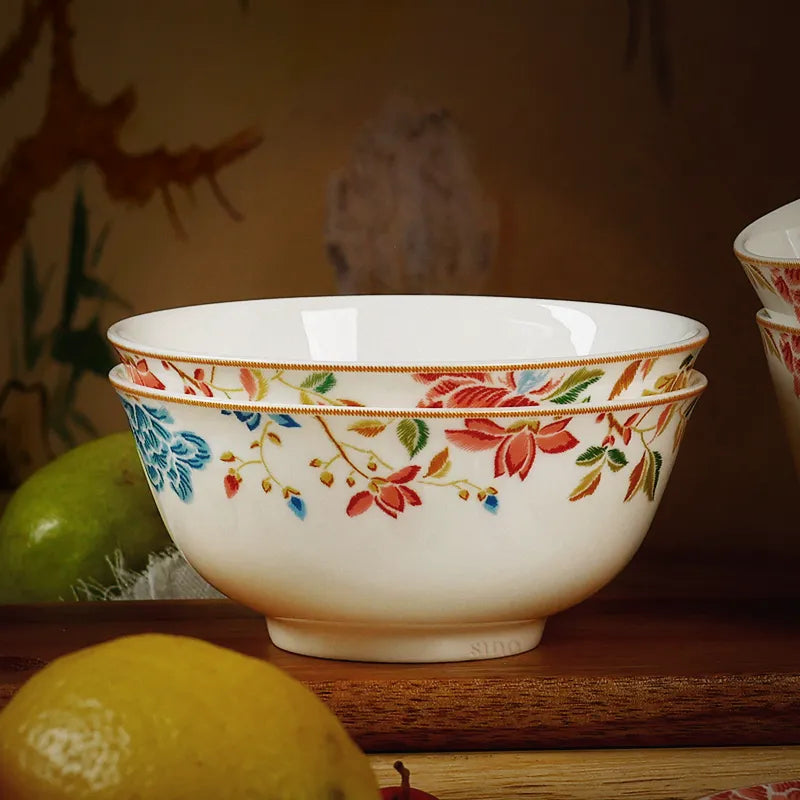 Stacked 2-piece Chinoiserie bone china round bowls on wooden shelf (front view).