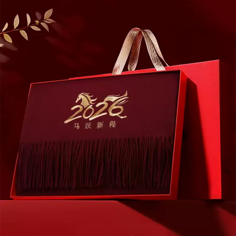 Premium gift box with gold foil accent, containing Galloping Grace Horse Year cashmere scarf.