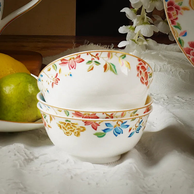 Three Chinoiserie bowls stacked together.