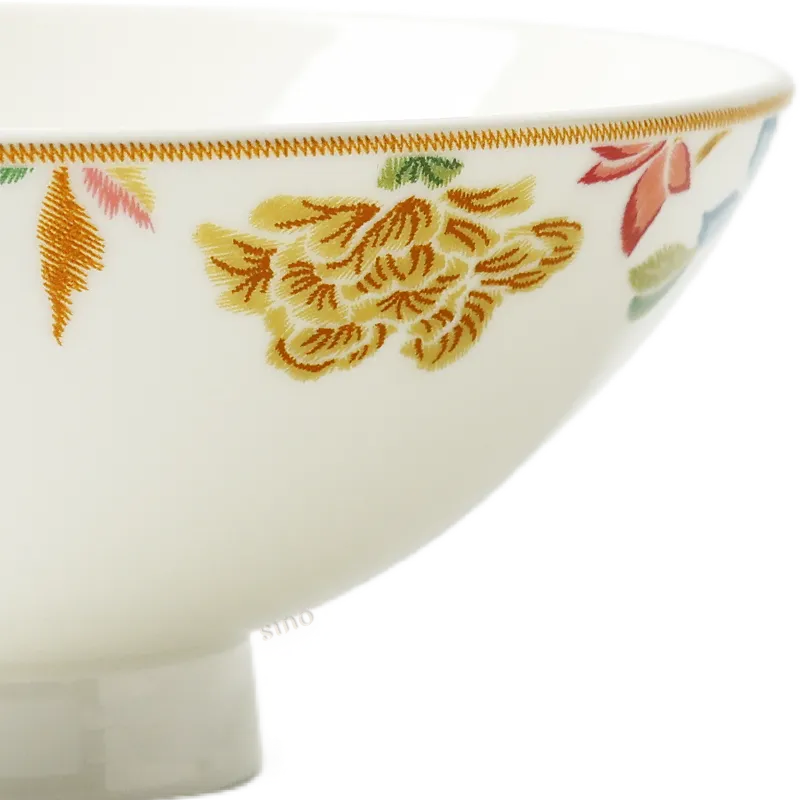 Left side floral detail of Chinoiserie footed bowl.