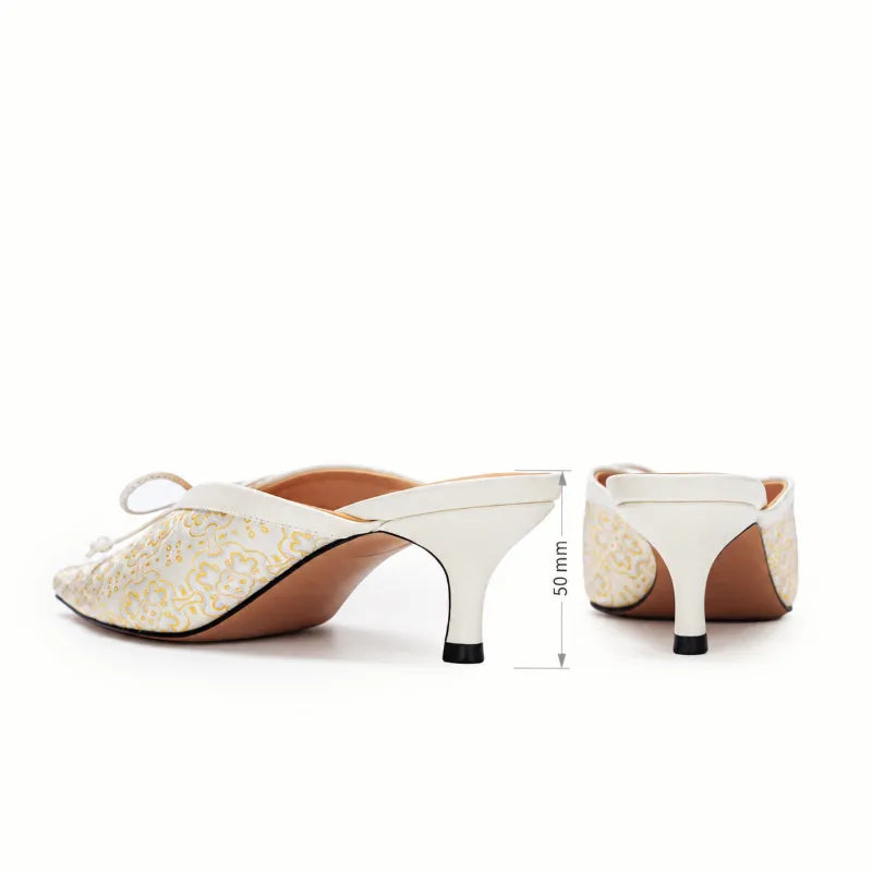 Luxury Song Brocade Ding Sheng kitten heel mules for women in ivory white with elegant Chinese silk craftsmanship.