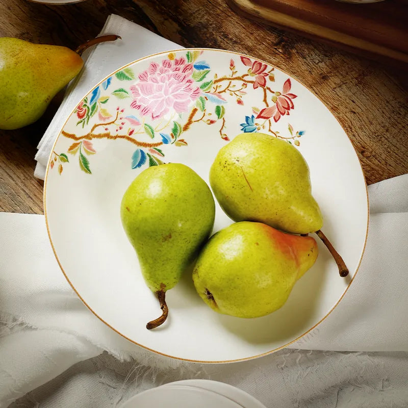 Top view of Chinoiserie round dinner plate with two pears.