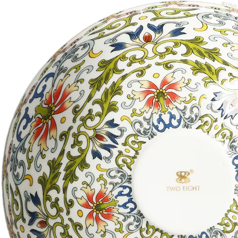 Close-up: left corner enamel artwork.