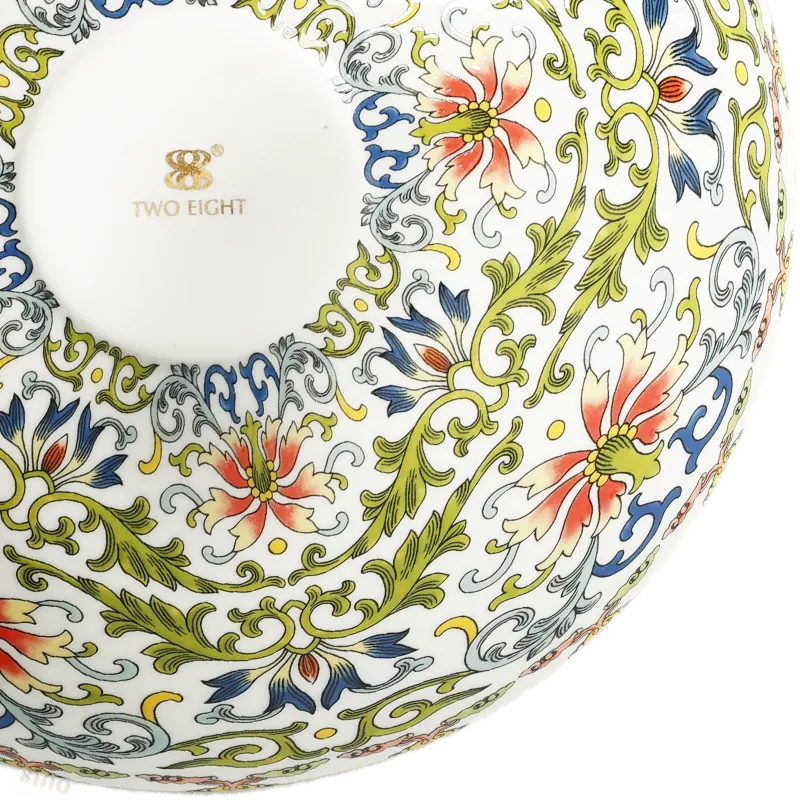 Close-up: right corner enamel artwork.