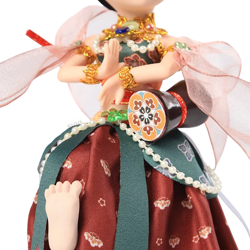 9-inch Dunhuang "Drumming Grace" doll's body and lifted foot showing dynamic pose.