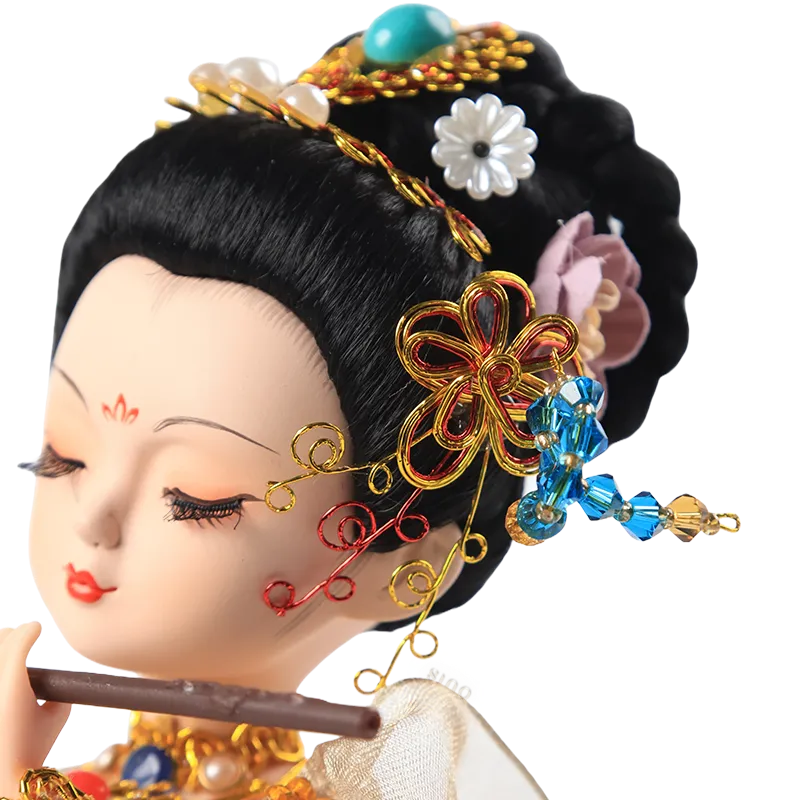 Left head detail of 9-inch Dunhuang "Flute Song" doll with hair and flowers.