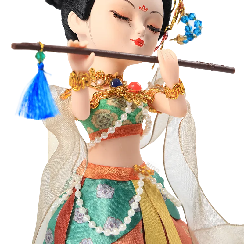 Right body and face detail of 9-inch Dunhuang "Flute Song" doll playing flute.
