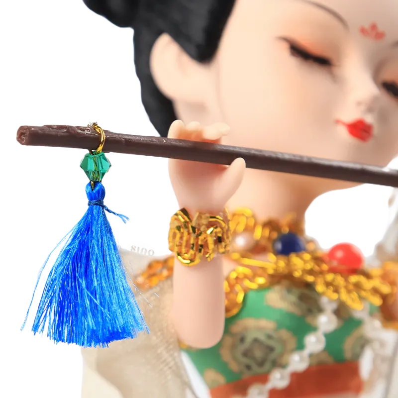 Right face, neck decor, and flute detail of 9-inch Dunhuang "Flute Song" doll.