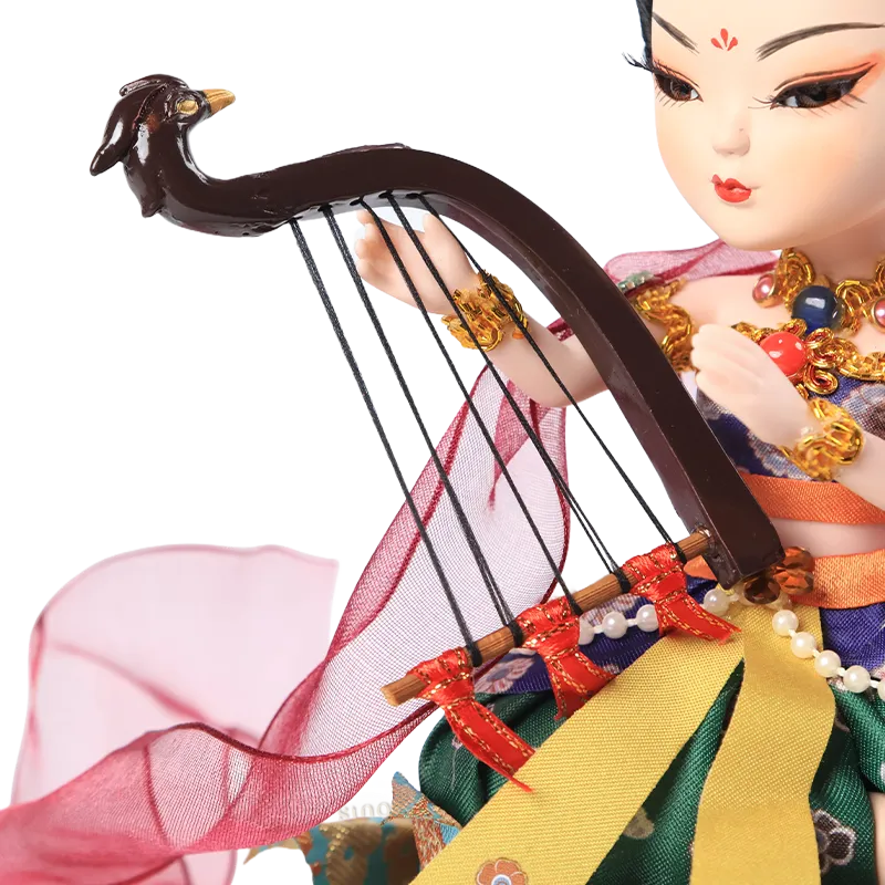 Left view of 9-inch Dunhuang doll playing harp with instrument and hand gesture detail.