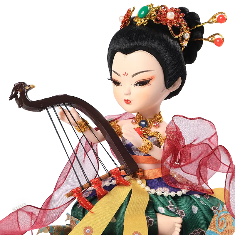 Left upper body detail of 9-inch Dunhuang "Harp Melody" doll showing arm, bracelet, and necklace.