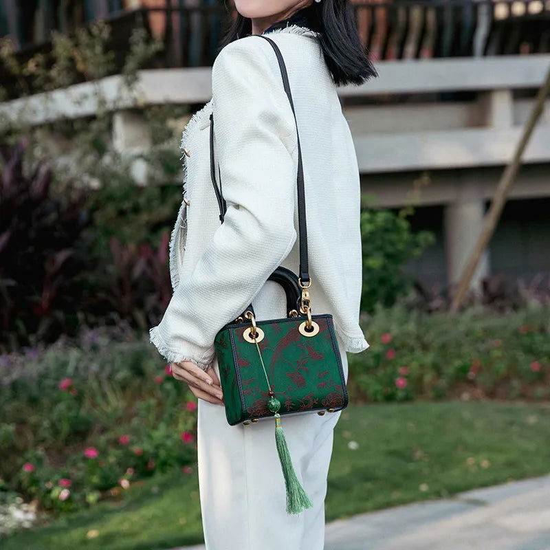Xiangyunsha Silk Green Retro Cowhide Handbag with Pendant - SinoCultural -- KM-0126-S3