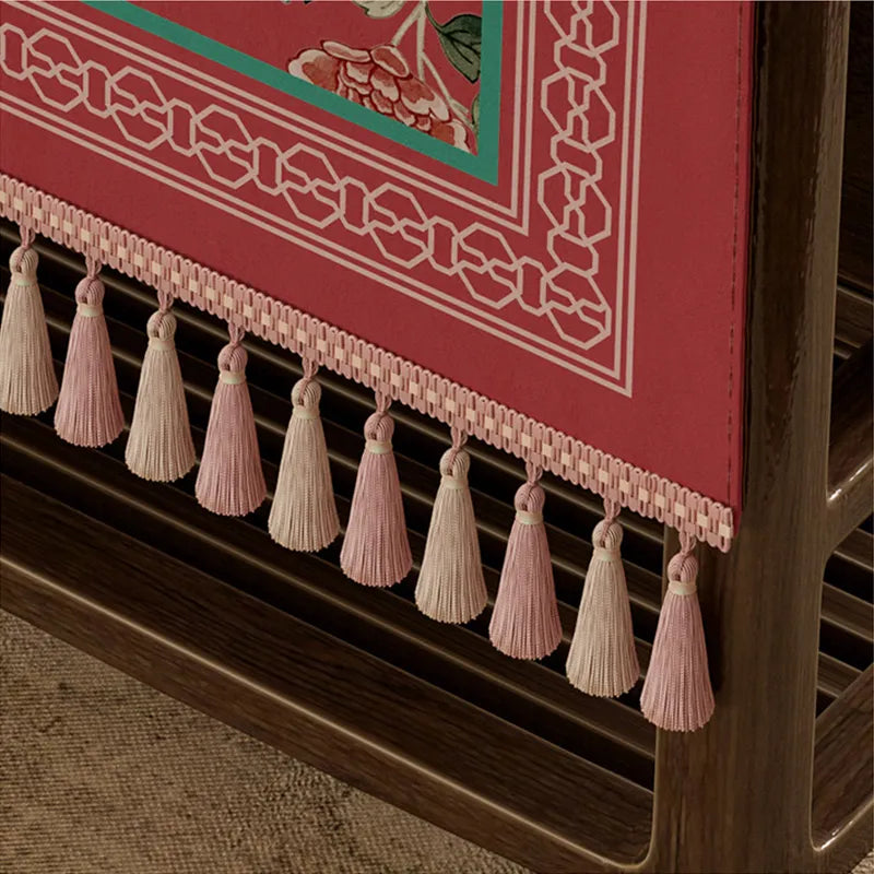 Handcrafted fringe detail on tablecloth edge.