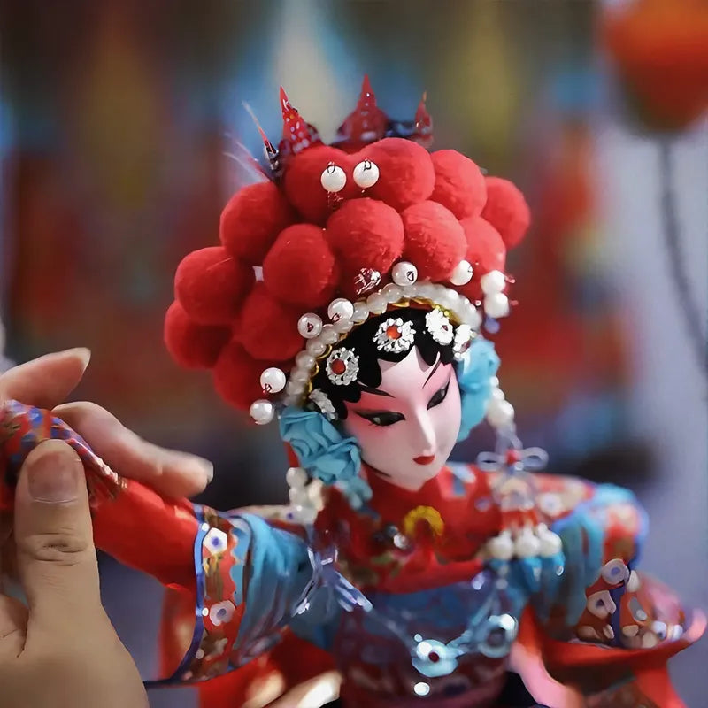 Each stitch whispers centuries of theatrical tradition, transforming the doll into a living canvas of China’s operatic legacy, cherished by hands that bridge ancestral artistry with modern reverence.