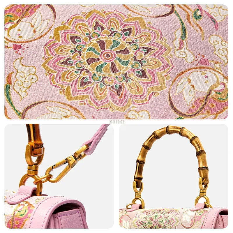 Close-up details of the pink Song brocade handbag, featuring floral and moon rabbit embroidery, metal clasp, and bamboo handle hardware.