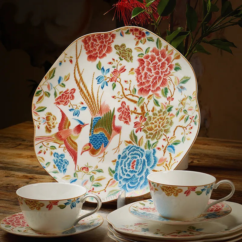 Square dinner plate upright with two cups in front.