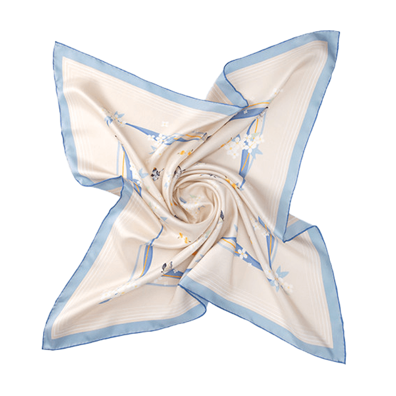 Butterfly Dream Mulberry Silk Square Scarf arranged in a flowing swirl, highlighting the beige design, blue border and delicate butterfly print.