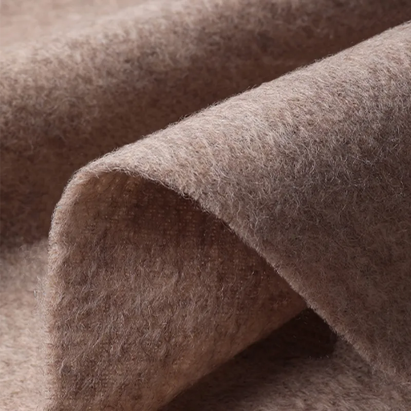 Precision-crafted edge on Chinese rose cashmere scarf.