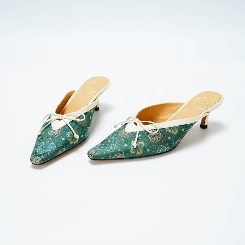 Chinese style Shu Brocade kitten heel mules showcasing emerald green woven patterns and craftsmanship.