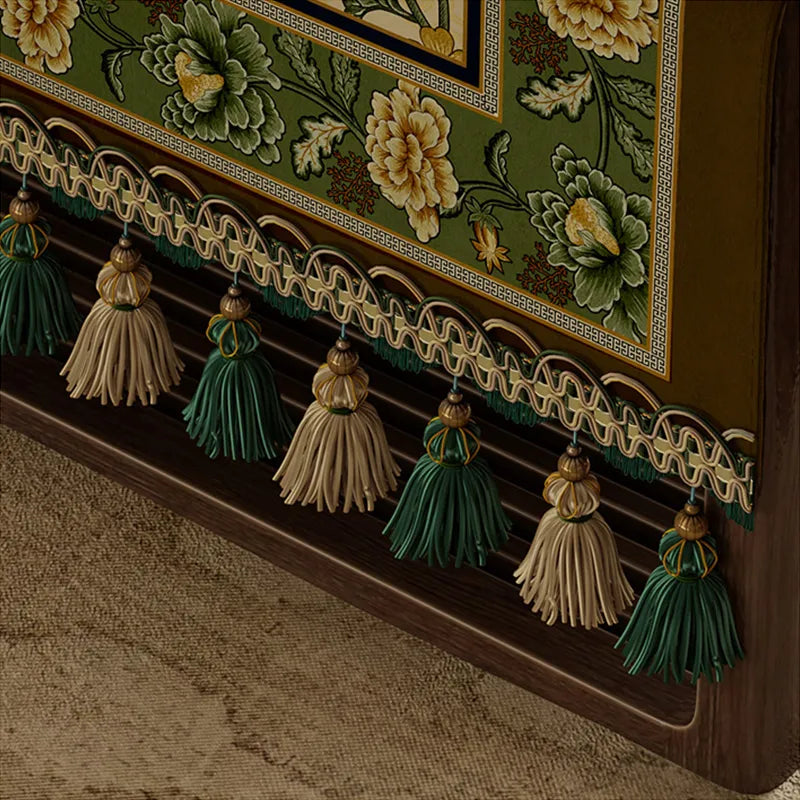 Hand-tied fringe detail on tablecloth edge.