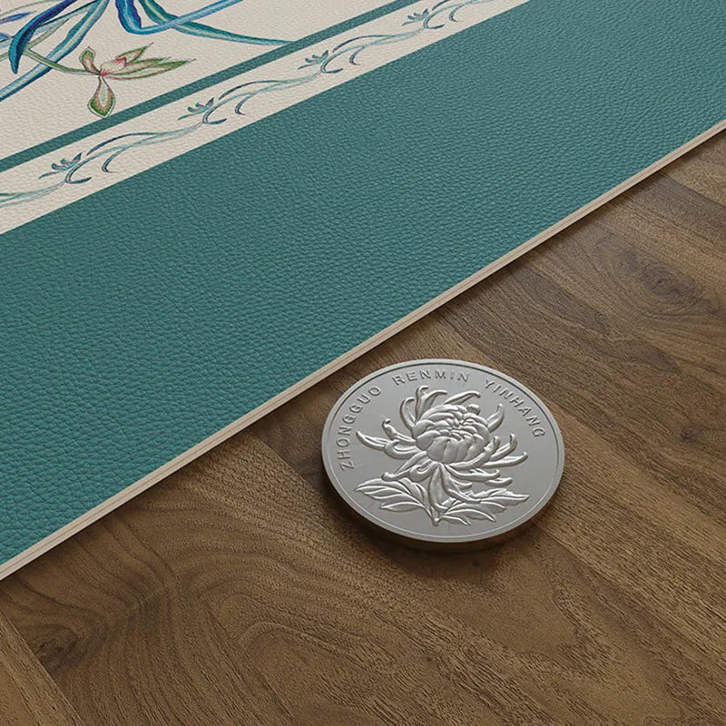 Chinoiserie blue leather nightstand mat with edge detail.