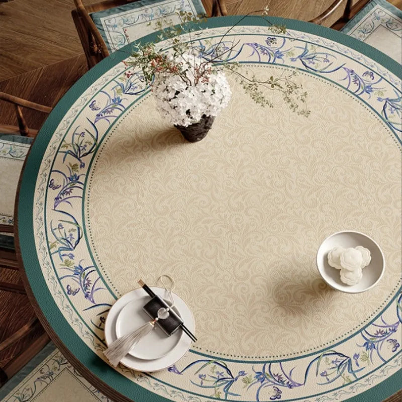 Chinoiserie blue round table mat with floral border top view.