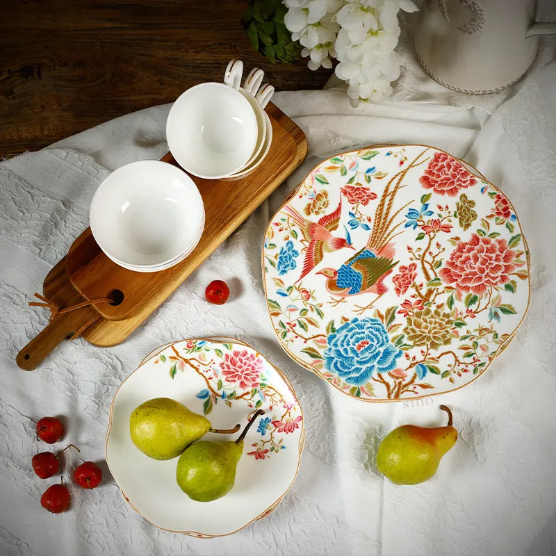 Top view of 12-piece Chinoiserie bone china square plate set with floral & bird design.