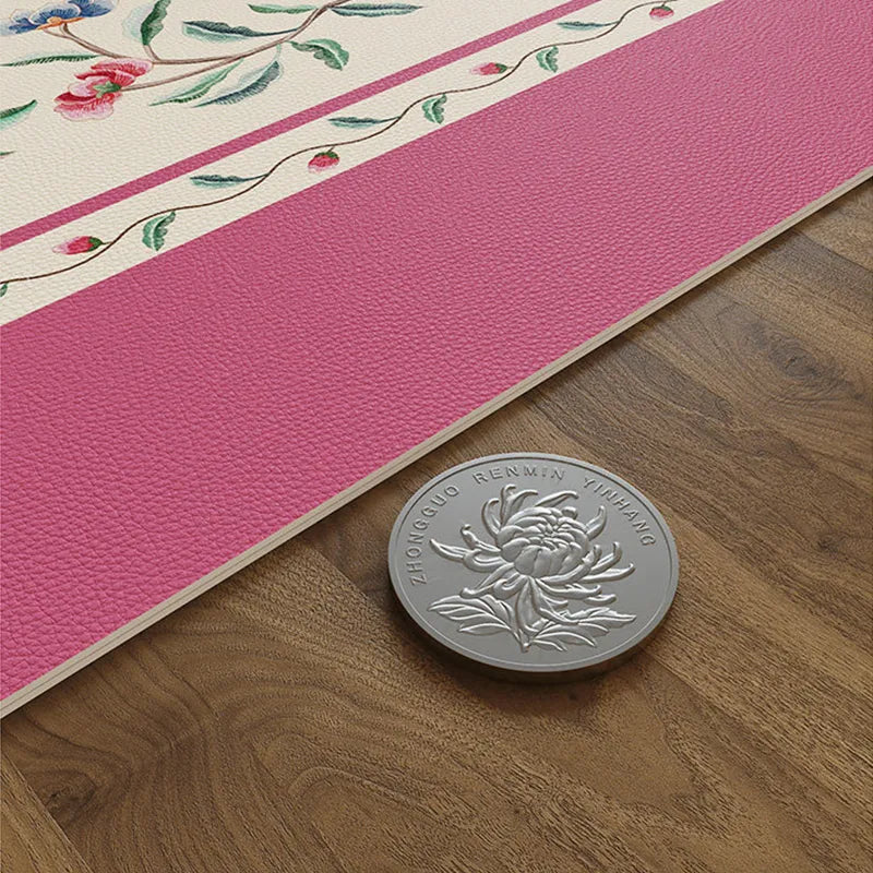 Chinoiserie coral pink leather cabinet mat edge detail.