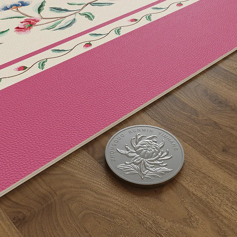 Chinoiserie coral pink leather coffee table mat edge detail.