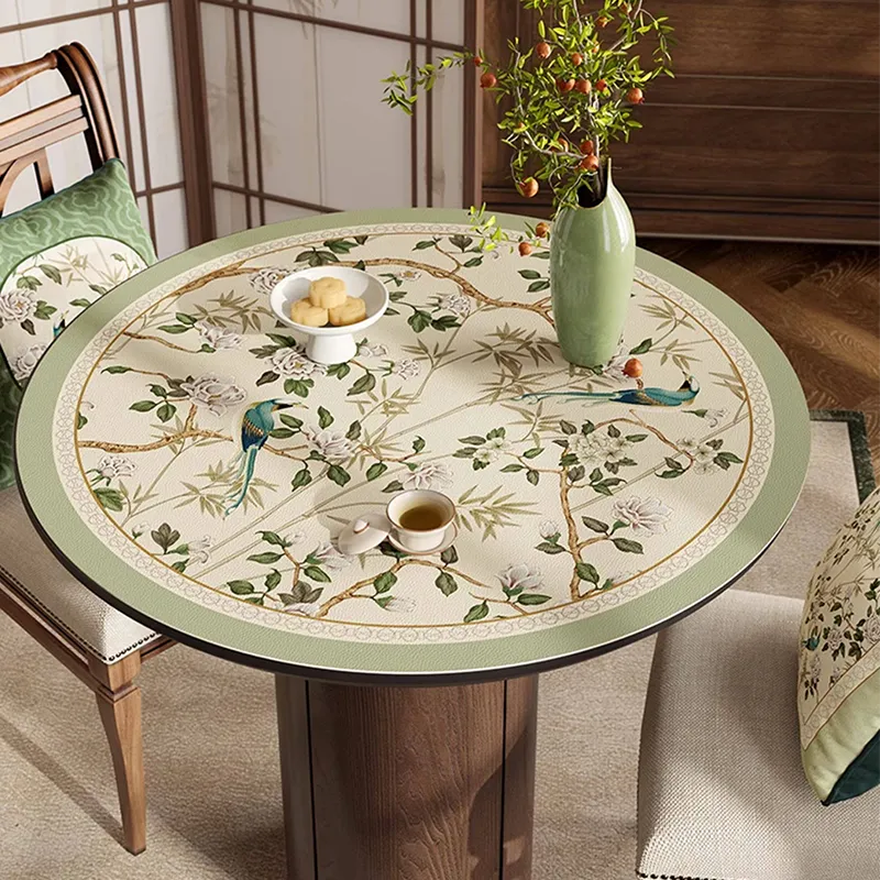 Style A single-layer chinoiserie jade green leather round table mat on a round table.