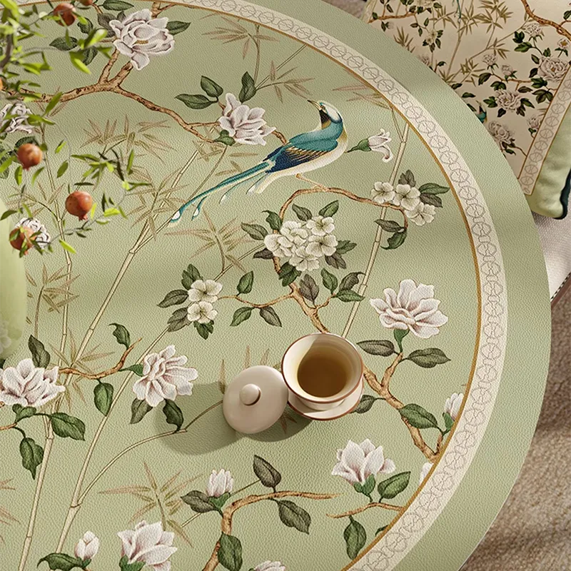 Overhead close-up of Style B jade green leather round table mat showing right-side pattern details.