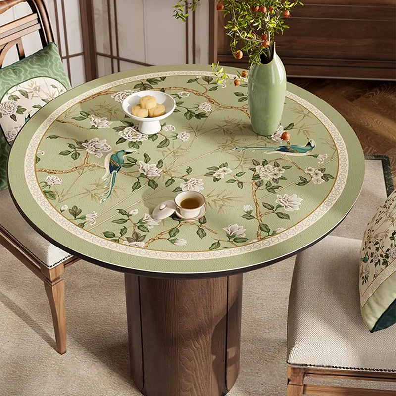 Style B single-layer chinoiserie jade green leather round table mat on a round table.