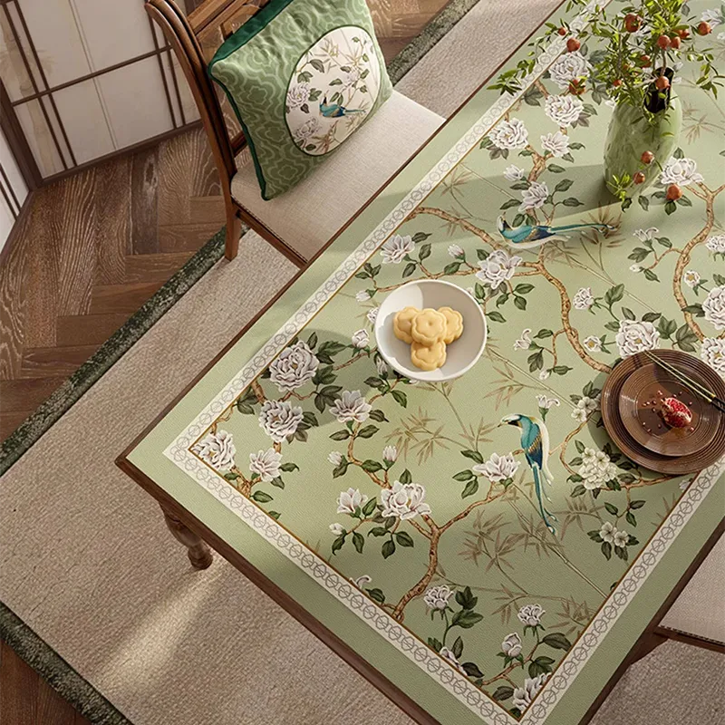 Overhead close-up of Style B pattern on chinoiserie jade green rectangular leather table mat.