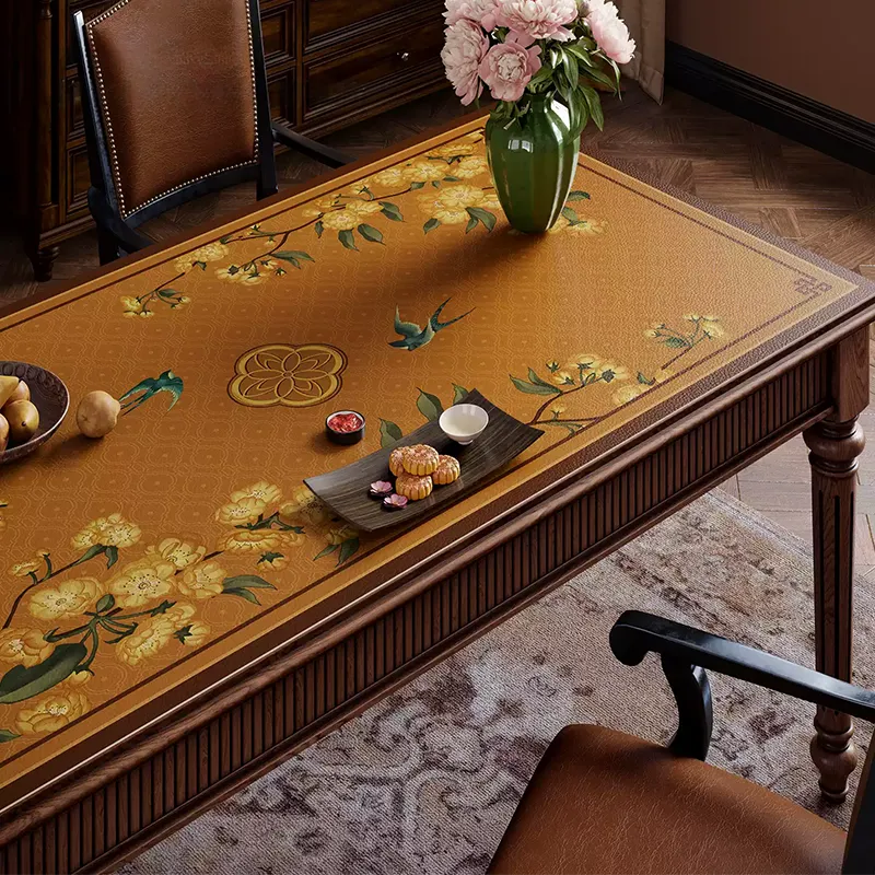 Right floral swallow pattern and leather texture on rectangular table.