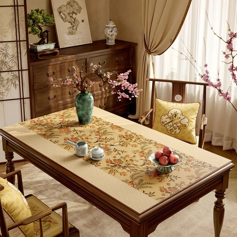 Autumn Splendor leather dining table mat styled with tea ware, flowers and golden Chinoiserie home decor.