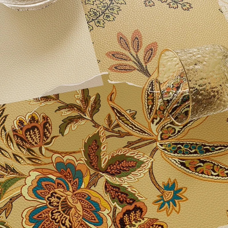 Waterproof Autumn Splendor leather nightstand mat with spilled water beading on the easy-clean surface.