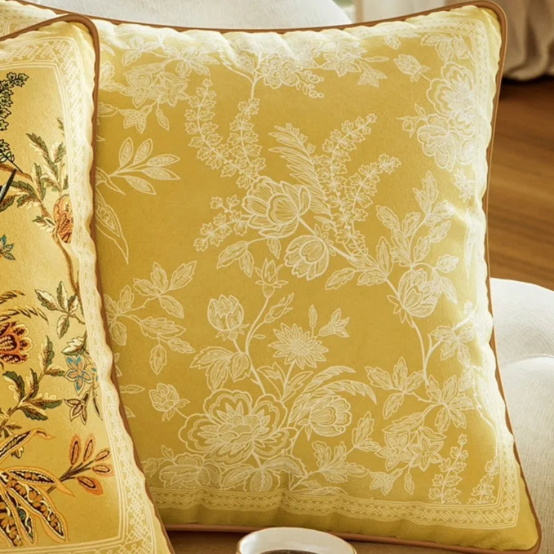 Autumn Splendor yellow accent pillow featuring delicate ivory floral linework for elegant Chinoiserie sofa and bedroom decor.