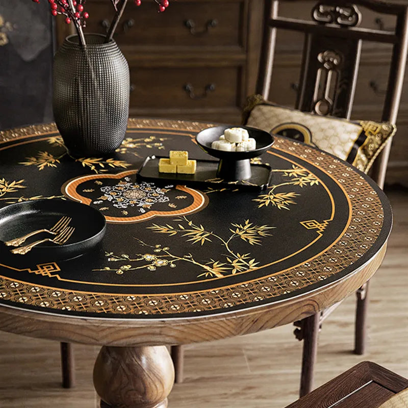 Black round table mat with Chinoiserie bamboo and Ruyi pattern.