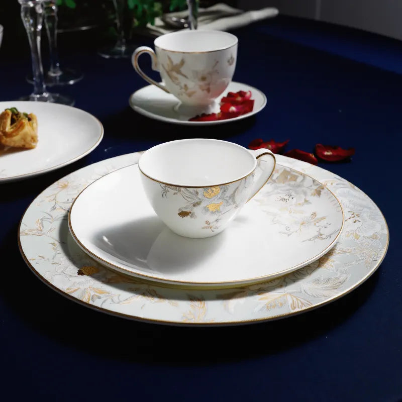 Layered table setting: Bone China Demitasse Cup on decorative plates