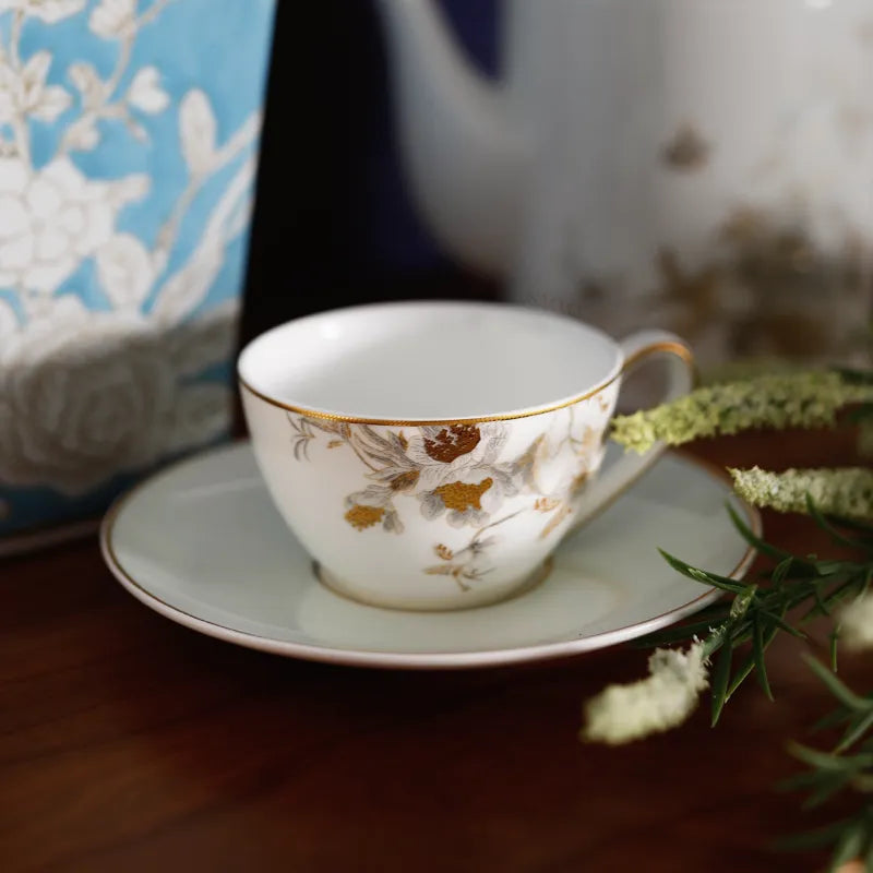 Demitasse cup set on wooden dining table.