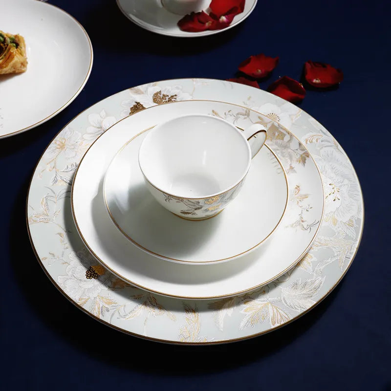 Overhead placement: Round Saucer with cup & matching Chinoiserie plates.