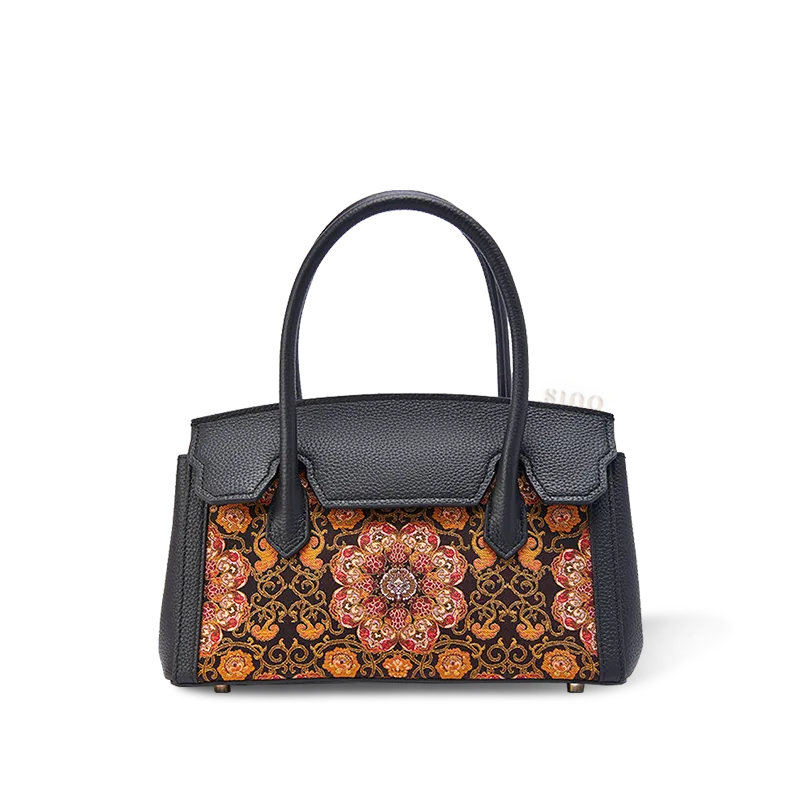 Luxury Dayun Brocade silk top-handle bag with pomegranate motif.