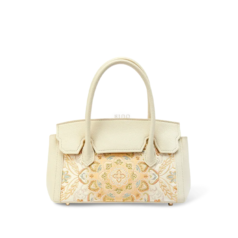 Chinoiserie luxury lotus motif leather embroidered handbag main view.