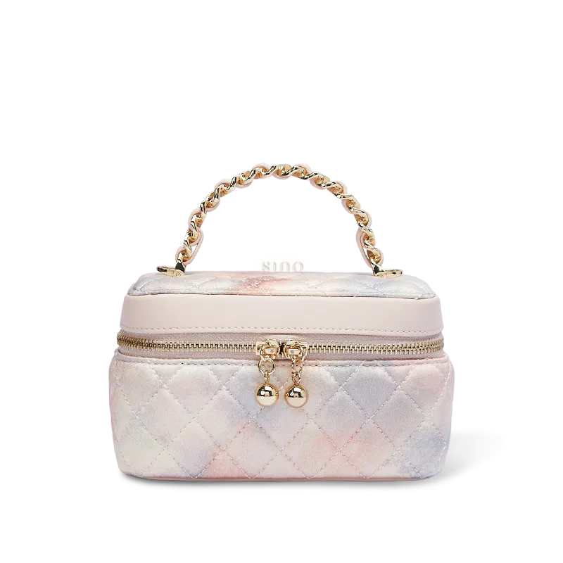 Luxury chinoiserie mulberry silk quilted makeup bag in white, front view on white background.