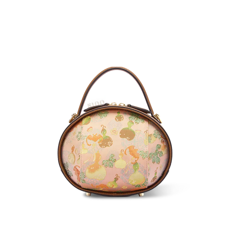 Front view of brown Song Brocade handbag with Gourd Pattern on white background.