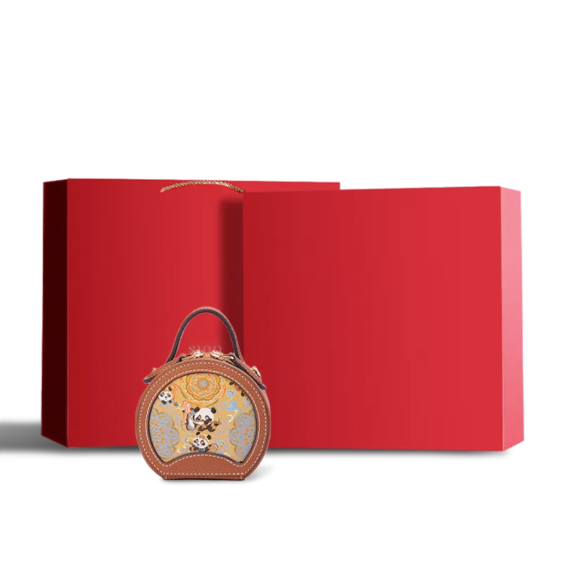 Chinoiserie Luxury Song Brocade Joyful Panda Motif mini round bag in a red gift box.