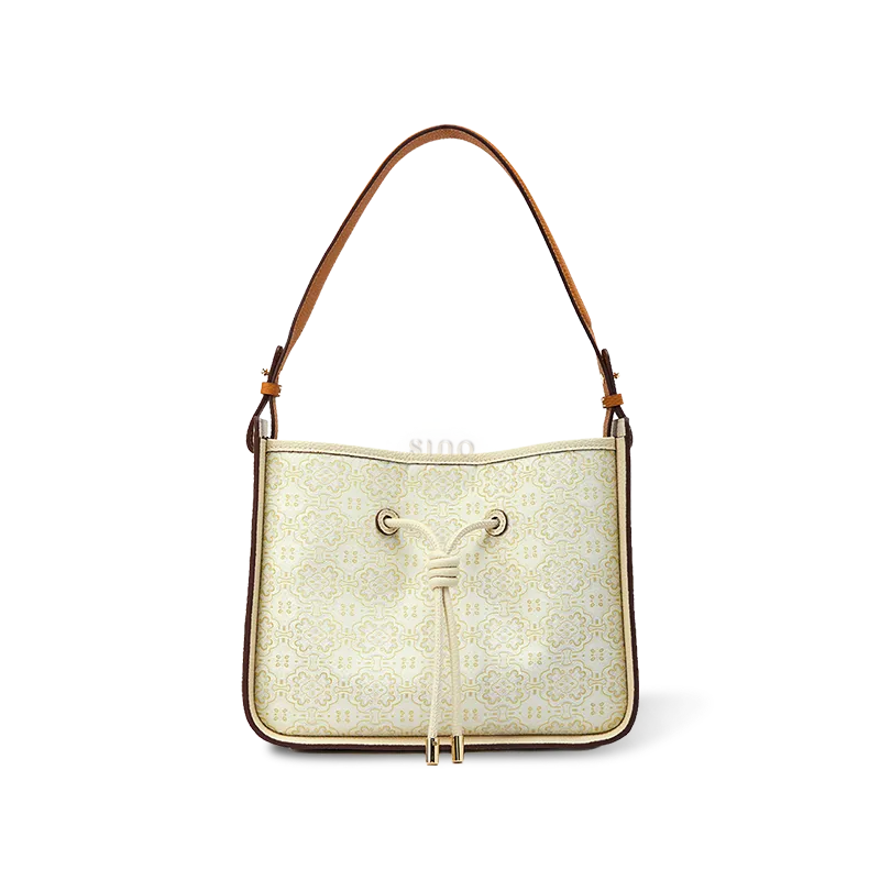 Luxury Song Brocade shoulder bag with embroidered Ding Sheng gold motif.