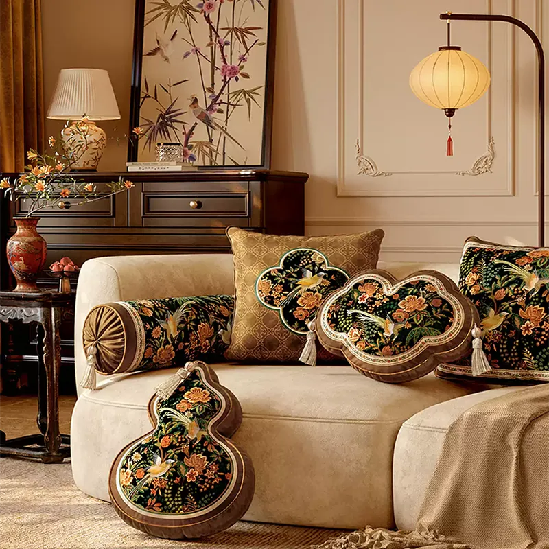 Armrest, square, ruyi pillows on sofa with gourd pillow on floor.