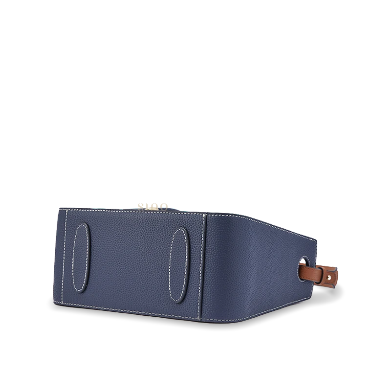 Bottom view of the Guardian Blessing leather shoulder bag showing the structured base and craftsmanship.