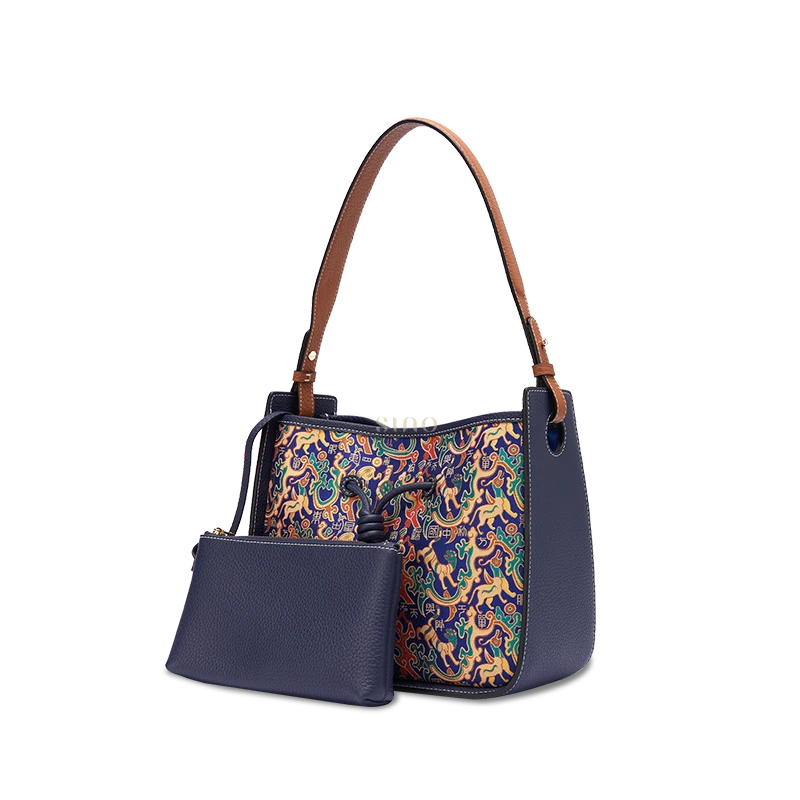 Guardian Blessing leather shoulder bag with pouch, angled front view, a structured handbag for women.